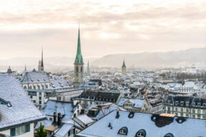 Old Zurich town in winter, view on lake - Work and earn